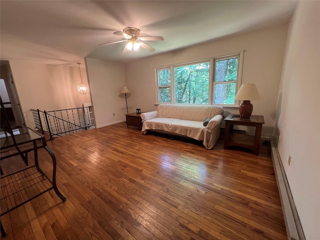 39 Hilltop Ln, Narrowsburg, NY 12764 - living room featuring wood-type flooring, ceiling fan, and baseboard heating