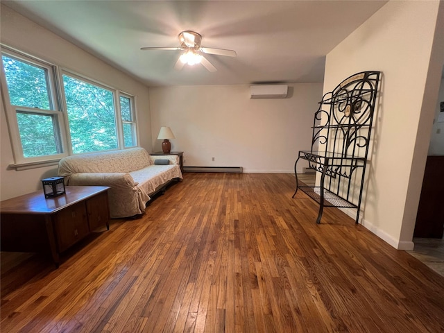 39 Hilltop Ln, Narrowsburg, NY 12764 - sitting room with baseboard heating, a wall mounted AC, hardwood / wood-style flooring, and ceiling fan