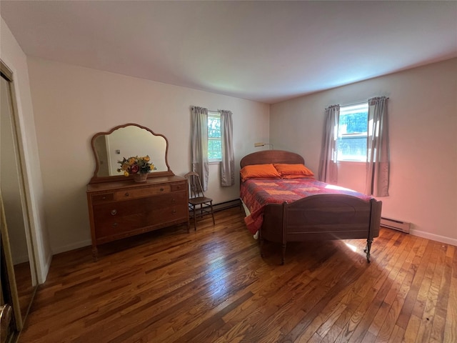 39 Hilltop Ln, Narrowsburg, NY 12764 - bedroom with hardwood / wood-style floors, multiple windows, and baseboard heating