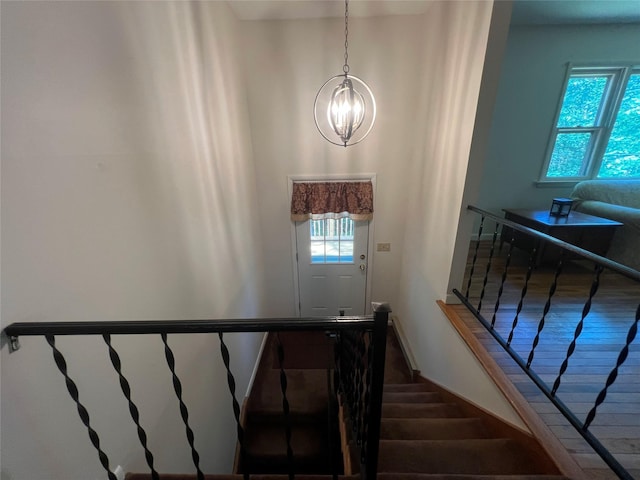 39 Hilltop Ln, Narrowsburg, NY 12764 - staircase featuring a chandelier and wood finished floors