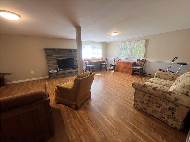 39 Hilltop Ln, Narrowsburg, NY 12764 - living area featuring wood finished floors and a fireplace