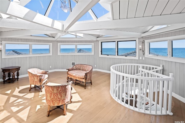 174 Dune Rd, Quogue, NY 11959 - sunroom / solarium with a skylight and a water view