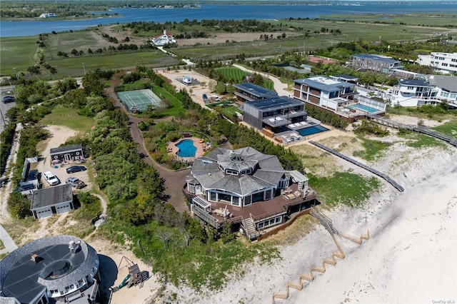 174 Dune Rd, Quogue, NY 11959 - aerial view of a large body of water and a pool area