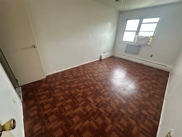 9444 45th Ave, Elmhurst, NY 11373 - empty room with a baseboard heating unit and a ceiling fan