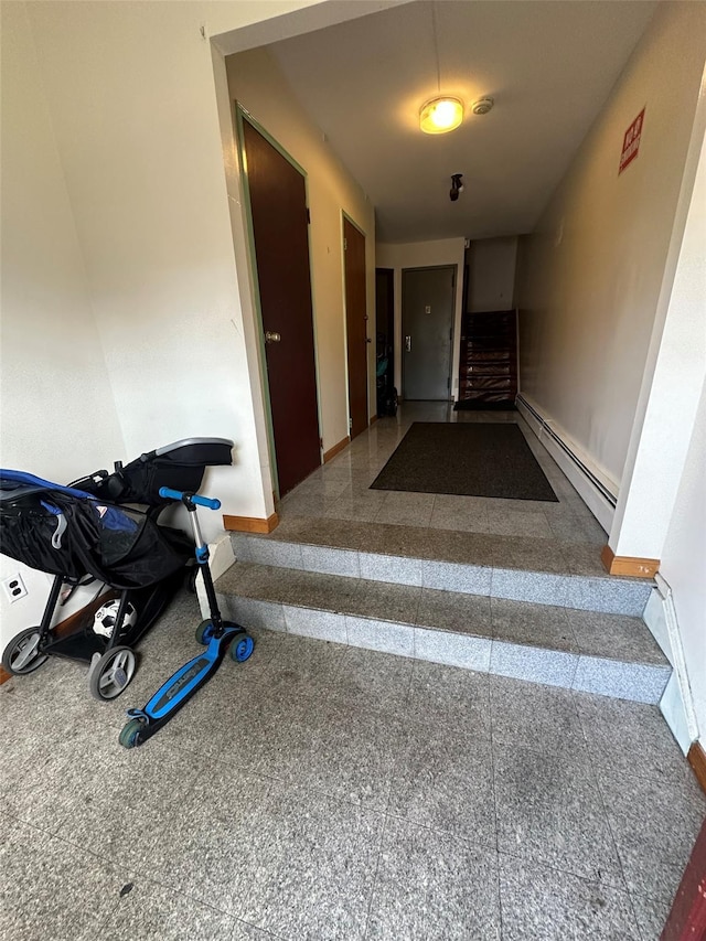 9444 45th Ave, Elmhurst, NY 11373 - stairs with baseboard heating and granite tiled floors
