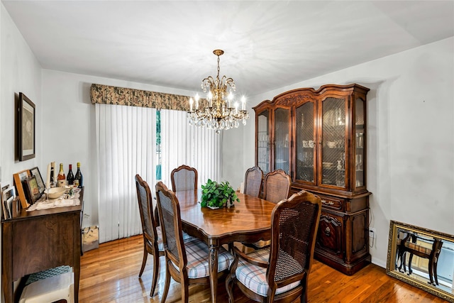 38 Mcarthur Ln, Smithtown, NY 11787 - dining space with a chandelier and light wood-style floors