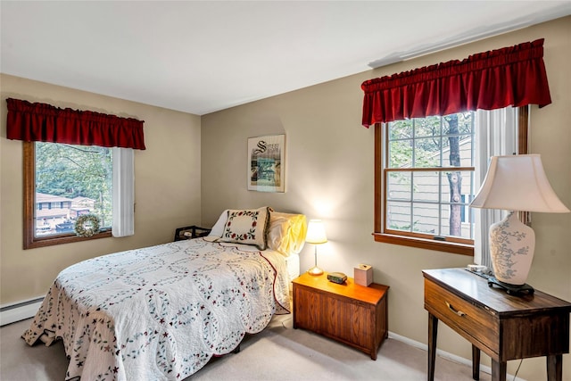 38 Mcarthur Ln, Smithtown, NY 11787 - carpeted bedroom featuring baseboards and a baseboard radiator