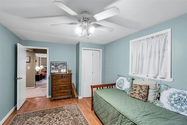 38 Mcarthur Ln, Smithtown, NY 11787 - bedroom featuring light wood-style floors, a closet, and a ceiling fan