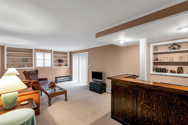 38 Mcarthur Ln, Smithtown, NY 11787 - living room featuring built in shelves, light colored carpet, wood walls, and a dry bar