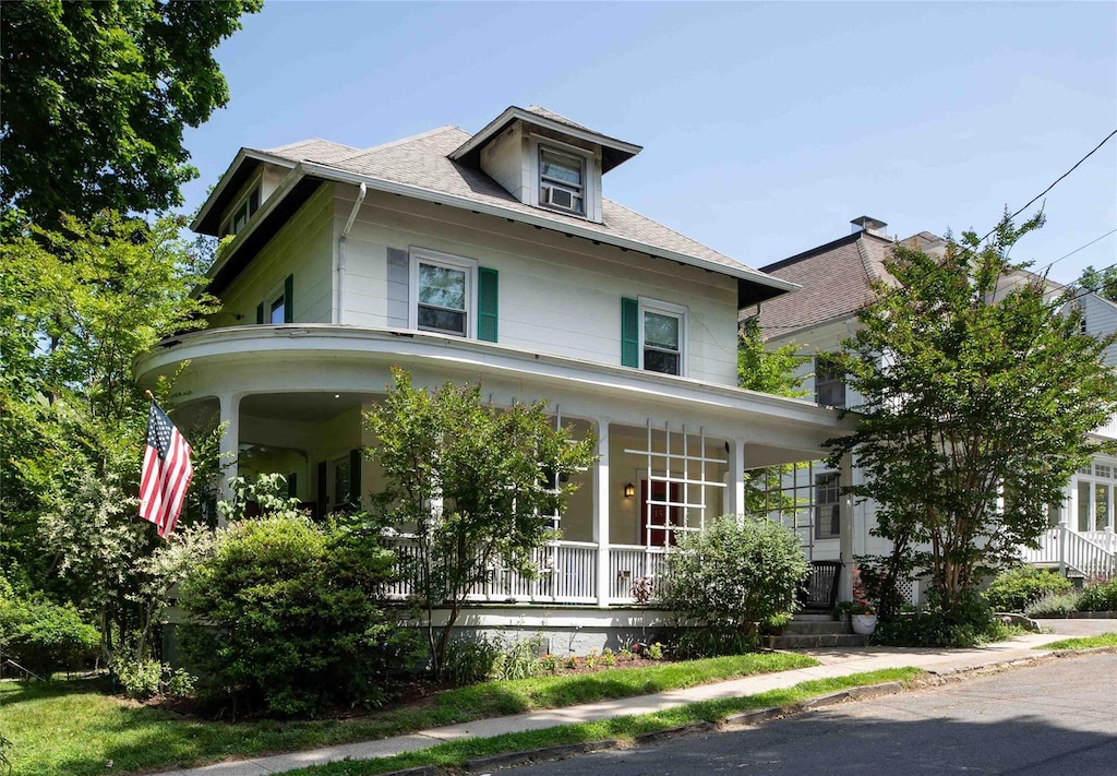 15 Fraser Pl, Hastings-On-Hudson, NY 10706 - traditional style home featuring covered porch and roof with shingles