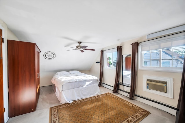 41 Meridian Rd, Levittown, NY 11756 - bedroom with vaulted ceiling, light colored carpet, a baseboard heating unit, and an AC wall unit