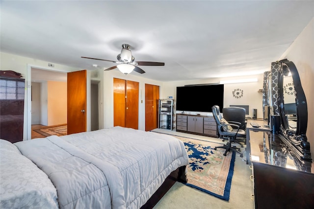 41 Meridian Rd, Levittown, NY 11756 - bedroom featuring an office area, a ceiling fan, and multiple closets