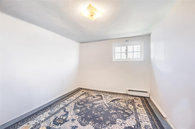 41 Meridian Rd, Levittown, NY 11756 - spare room featuring a baseboard heating unit and baseboards
