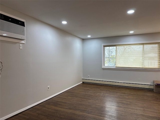 3666 Illona Ln, Oceanside, NY 11572 - spare room featuring a baseboard radiator, wood finished floors, recessed lighting, and an AC wall unit