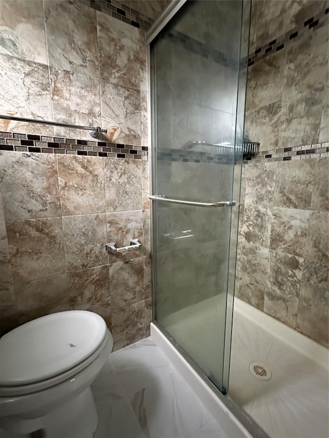 3666 Illona Ln, Oceanside, NY 11572 - bathroom with a stall shower and marble finish floors