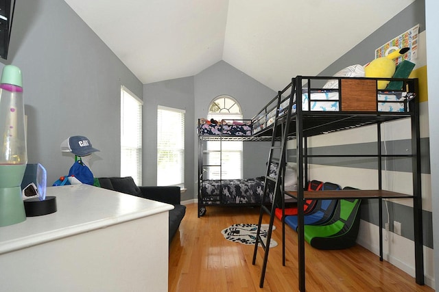 1405 Constance Ln, Port Jefferson Station, NY 11776 - bedroom featuring wood finished floors and vaulted ceiling