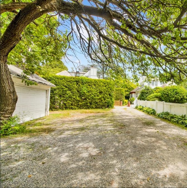 431 E Sidney Ave, Mount Vernon, NY 10553 - view of yard featuring a garage