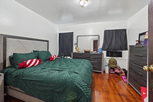 317 Hawthorne Ave, Yonkers, NY 10705 - bedroom featuring wood finished floors and cooling unit