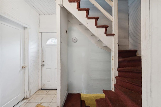 317 Hawthorne Ave, Yonkers, NY 10705 - foyer with stairs and light tile patterned floors