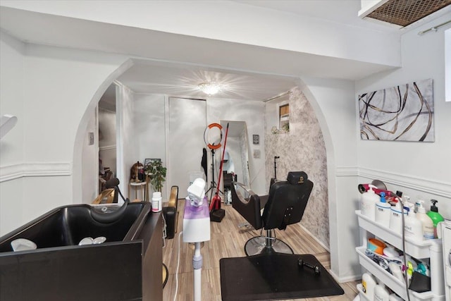 317 Hawthorne Ave, Yonkers, NY 10705 - interior space featuring arched walkways and wood finished floors