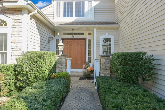 35 Monterrey Dr, Saint James, NY 11780 - property entrance featuring stone siding