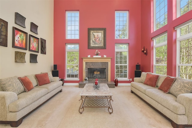 35 Monterrey Dr, Saint James, NY 11780 - living area with a high ceiling, carpet, and a premium fireplace