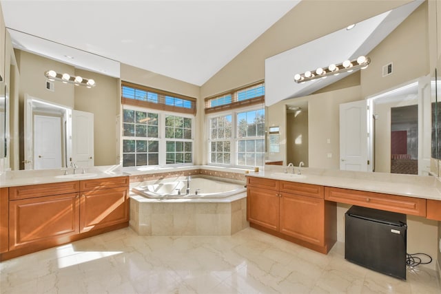 35 Monterrey Dr, Saint James, NY 11780 - full bath featuring a garden tub, two vanities, marble finish flooring, and high vaulted ceiling