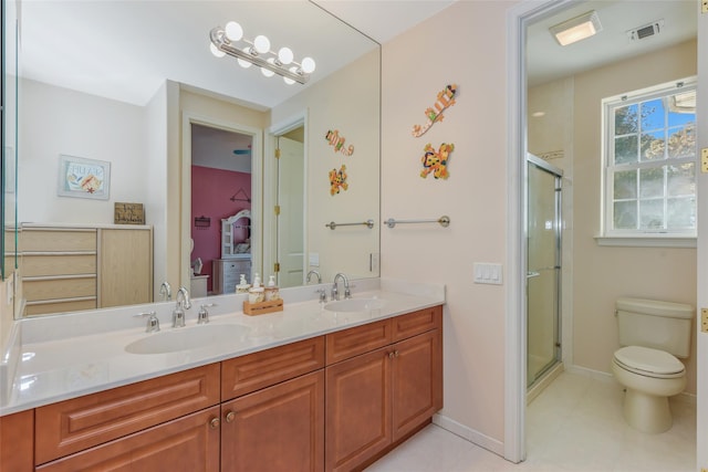 35 Monterrey Dr, Saint James, NY 11780 - bathroom with double vanity, a stall shower, and tile patterned flooring