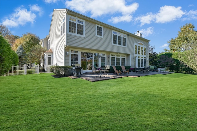 35 Monterrey Dr, Saint James, NY 11780 - back of house with a patio area and a chimney