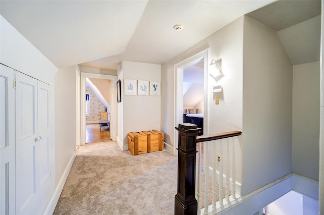 12 Beechwood Ter, Poughkeepsie, NY 12601 - hallway featuring an upstairs landing, carpet flooring, and vaulted ceiling