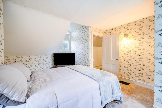 12 Beechwood Ter, Poughkeepsie, NY 12601 - carpeted bedroom with wallpapered walls and vaulted ceiling