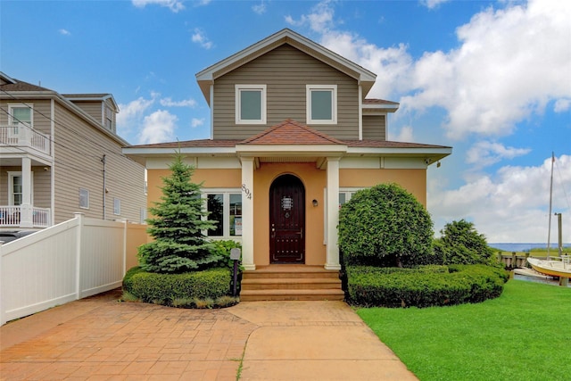 894 Bay 9th St, West Islip, NY 11795 - view of front of property featuring a shingled roof and stucco siding