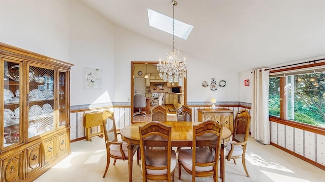 1 Harbour Unit 1, Blue Point, NY 11715 - dining room with light carpet, a skylight, a chandelier, and high vaulted ceiling