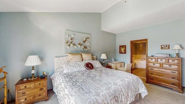 1 Harbour Unit 1, Blue Point, NY 11715 - bedroom with light carpet, high vaulted ceiling, and connected bathroom