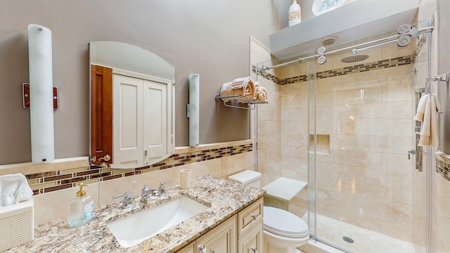 1 Harbour Unit 1, Blue Point, NY 11715 - bathroom featuring vanity, a stall shower, and backsplash