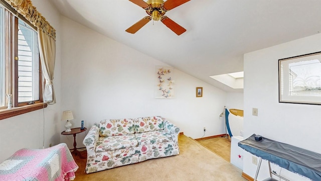 1 Harbour Unit 1, Blue Point, NY 11715 - living area featuring a skylight, carpet floors, ceiling fan, and lofted ceiling