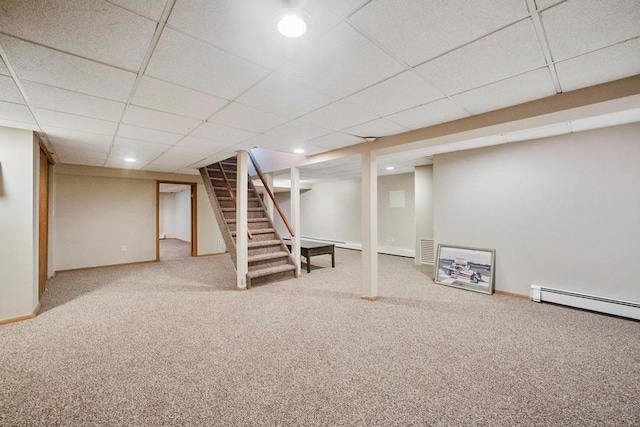 15 Stillwood Rd, Brookhaven, NY 11719 - finished below grade area featuring carpet, a baseboard heating unit, stairs, a paneled ceiling, and recessed lighting