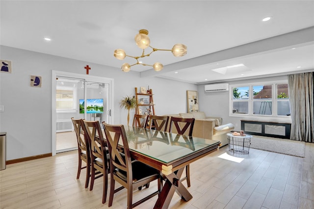 206 Friends Ln, Westbury, NY 11590 - dining room with an AC wall unit, light wood-type flooring, recessed lighting, and a chandelier