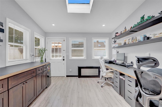 206 Friends Ln, Westbury, NY 11590 - home office featuring light wood-style floors, a skylight, recessed lighting, and vaulted ceiling