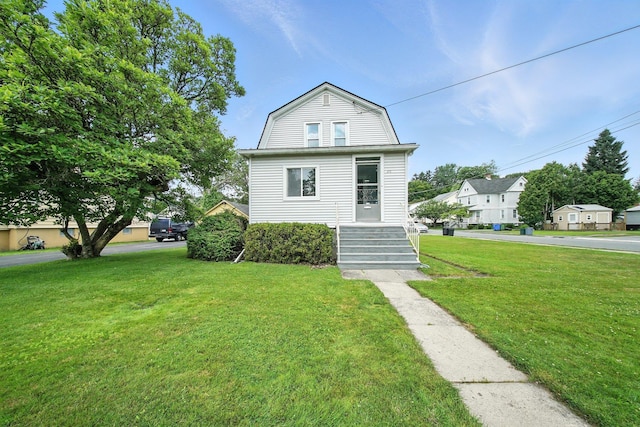 20 Columbia Ave, Middletown, NY 10940 - dutch colonial with a front yard, a gambrel roof, and a residential view
