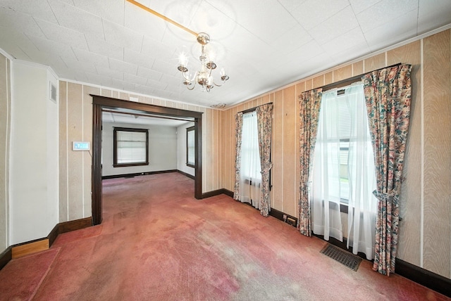 20 Columbia Ave, Middletown, NY 10940 - unfurnished dining area featuring carpet, healthy amount of natural light, a chandelier, and ornamental molding