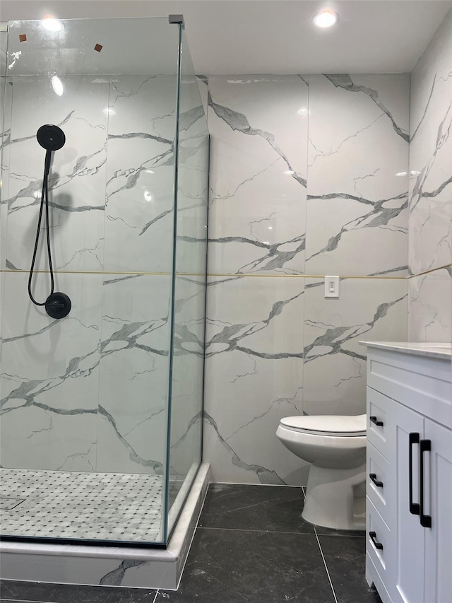 190 Springdale Dr, Ronkonkoma, NY 11779 - full bath with a marble finish shower, tile walls, and vanity