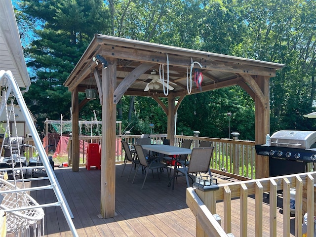 190 Springdale Dr, Ronkonkoma, NY 11779 - wooden deck with a gazebo, outdoor dining area, area for grilling, and view of wooded area