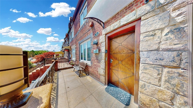 20 Corbin Pl, Brooklyn, NY 11235 - entrance to property with stone siding