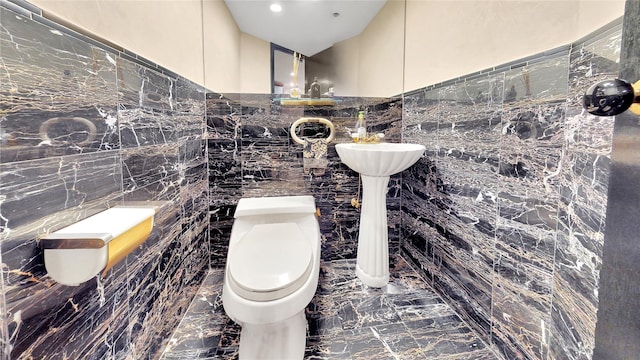 20 Corbin Pl, Brooklyn, NY 11235 - bathroom with tile walls and marble tiled floors
