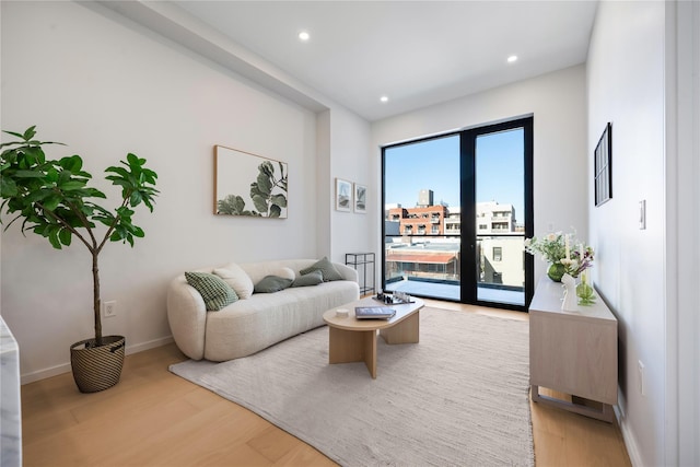 3116 21st St Unit Ph2F, Astoria, NY 11106 - living area featuring light wood finished floors and recessed lighting
