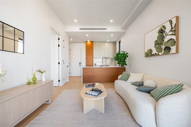 3116 21st St Unit Ph2F, Astoria, NY 11106 - living room featuring light wood-style flooring and recessed lighting