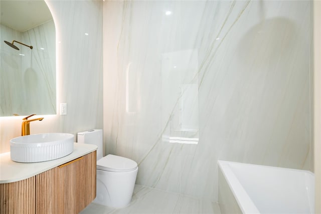 3116 21st St Unit Ph2F, Astoria, NY 11106 - full bath with vanity, a marble finish shower, and a bathtub