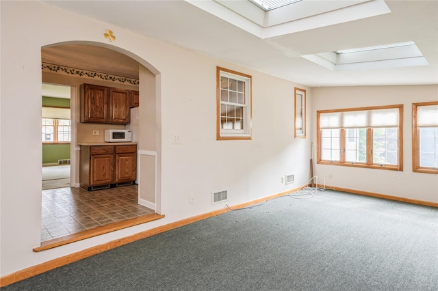 5 Hillaire Pl, Nanuet, NY 10954 - empty room with carpet flooring and arched walkways