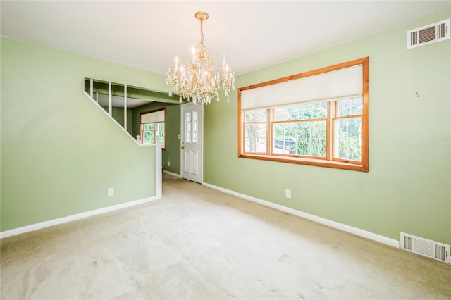5 Hillaire Pl, Nanuet, NY 10954 - unfurnished room with a chandelier, carpet floors, and stairs